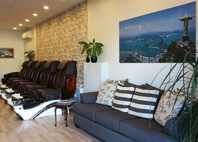 Relaxing lounge at Rio Beauty, Napier, Hawke's Bay, NZ, featuring plush chairs and tranquil decor.