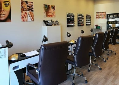 Modern nail salon interior at Rio Beauty, Napier, Hawke's Bay, NZ showcasing elegant seating and decor.