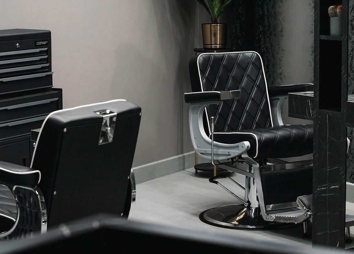 Elegant barber chairs and tools at Collab Cuts, Lanark, Scotland, GB ready for a premium grooming experience.