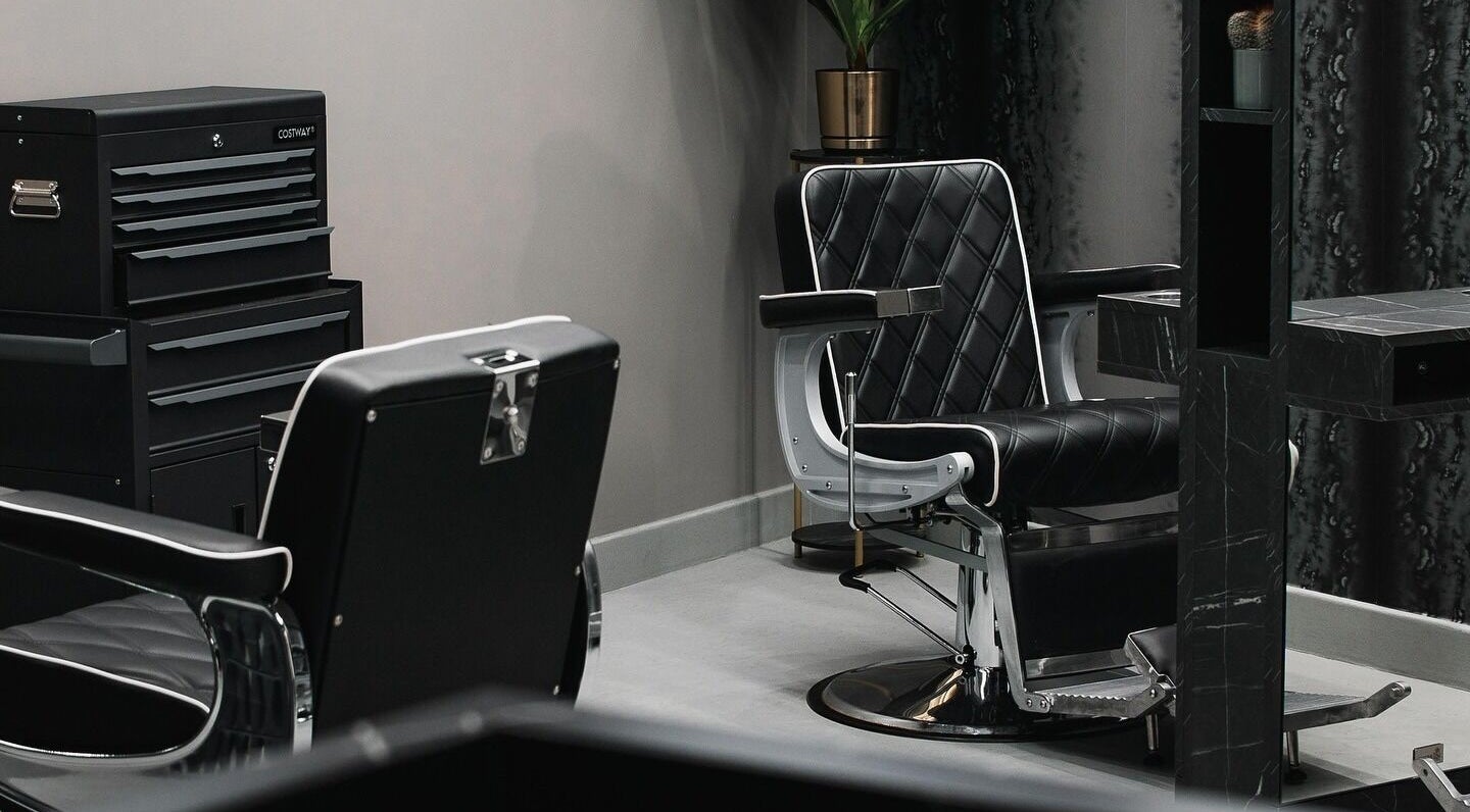Elegant barber chairs and tools at Collab Cuts, Lanark, Scotland, GB ready for a premium grooming experience.
