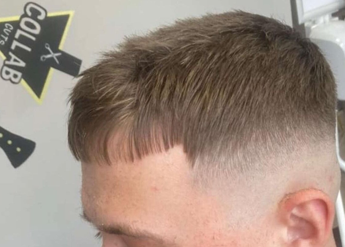 Close-up of a stylish haircut at Collab Cuts in Lanark, Scotland, GB, showcasing expert styling techniques.