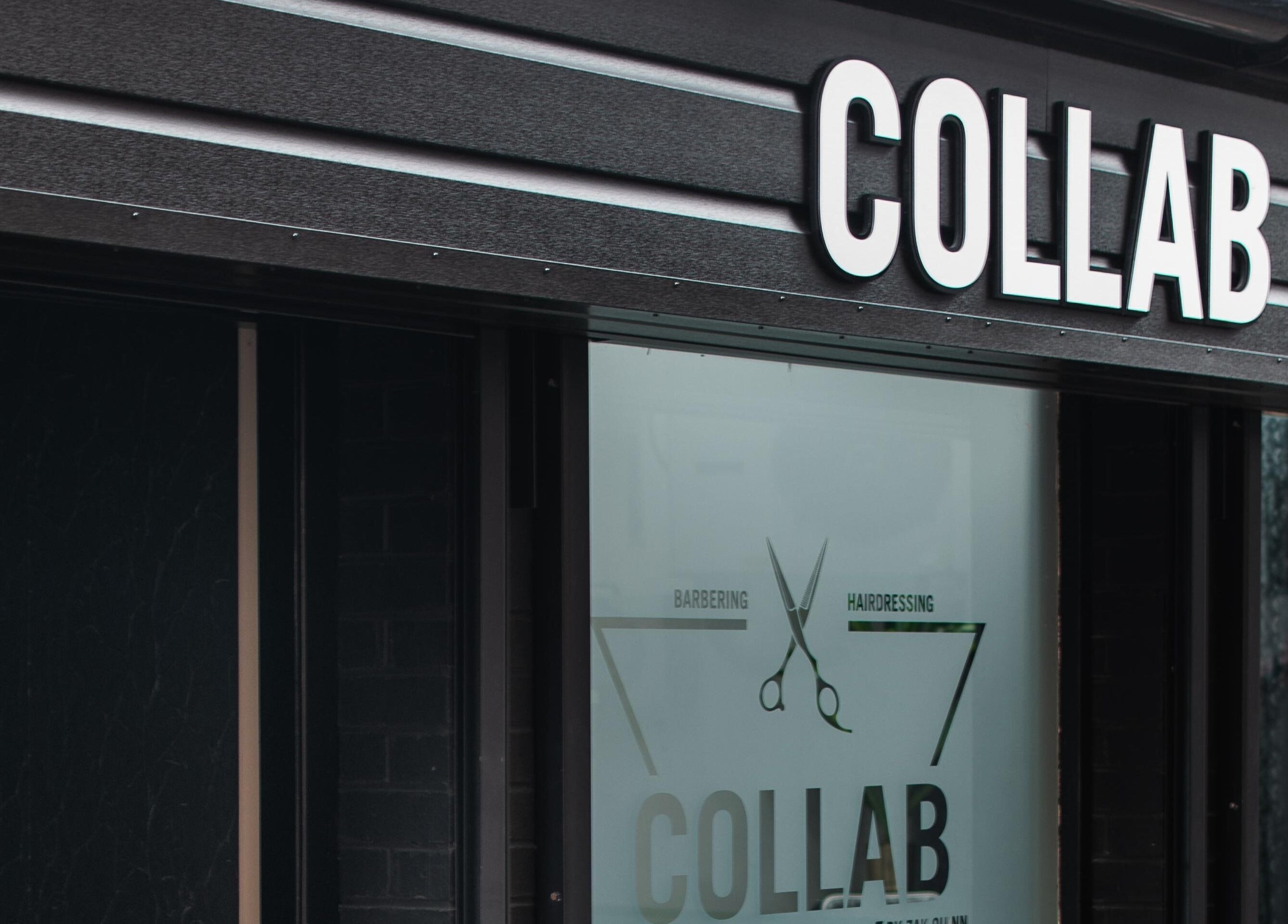 Collab Cuts storefront in Lanark, Scotland, GB with vibrant signage and modern design.
