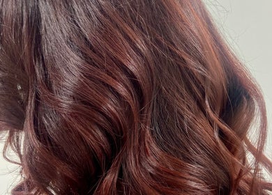 Beautiful wavy brown hair styled at Danielle Dunn Hairstylist & Extensionists, Motherwell, Scotland, GB.