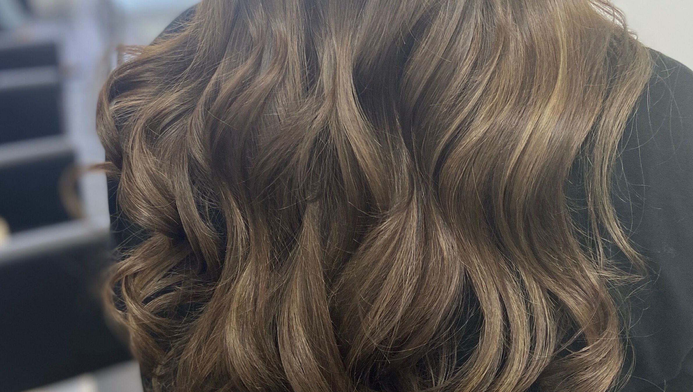 Elegant wavy hairstyle by Danielle Dunn Hairstylist & Extensionists, Motherwell, Scotland, GB.