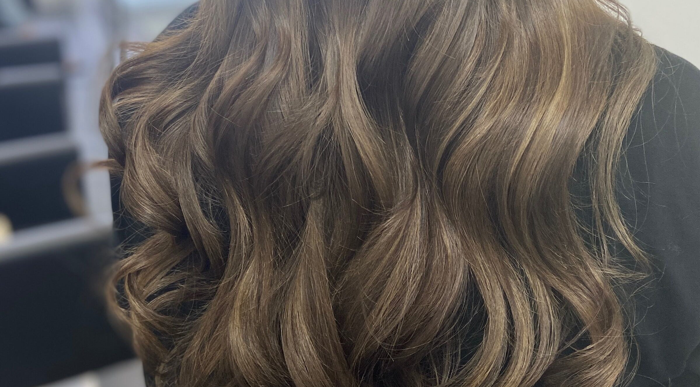 Elegant wavy hairstyle by Danielle Dunn Hairstylist & Extensionists, Motherwell, Scotland, GB.