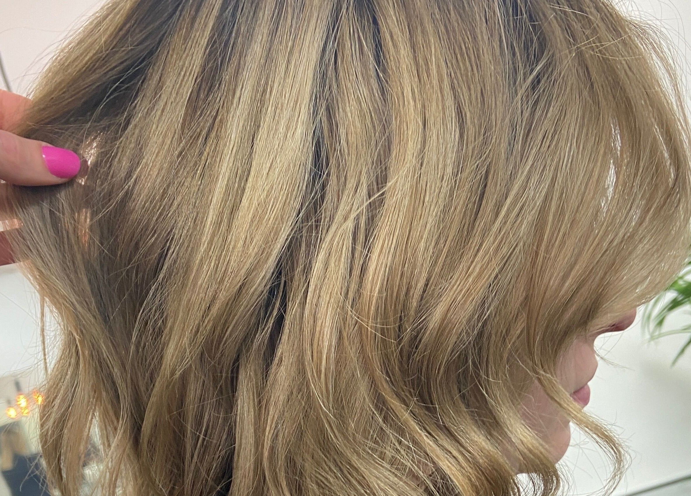 Close-up of stylish golden waves at Danielle Dunn Hairstylist & Extensionists, Motherwell, Scotland, GB.
