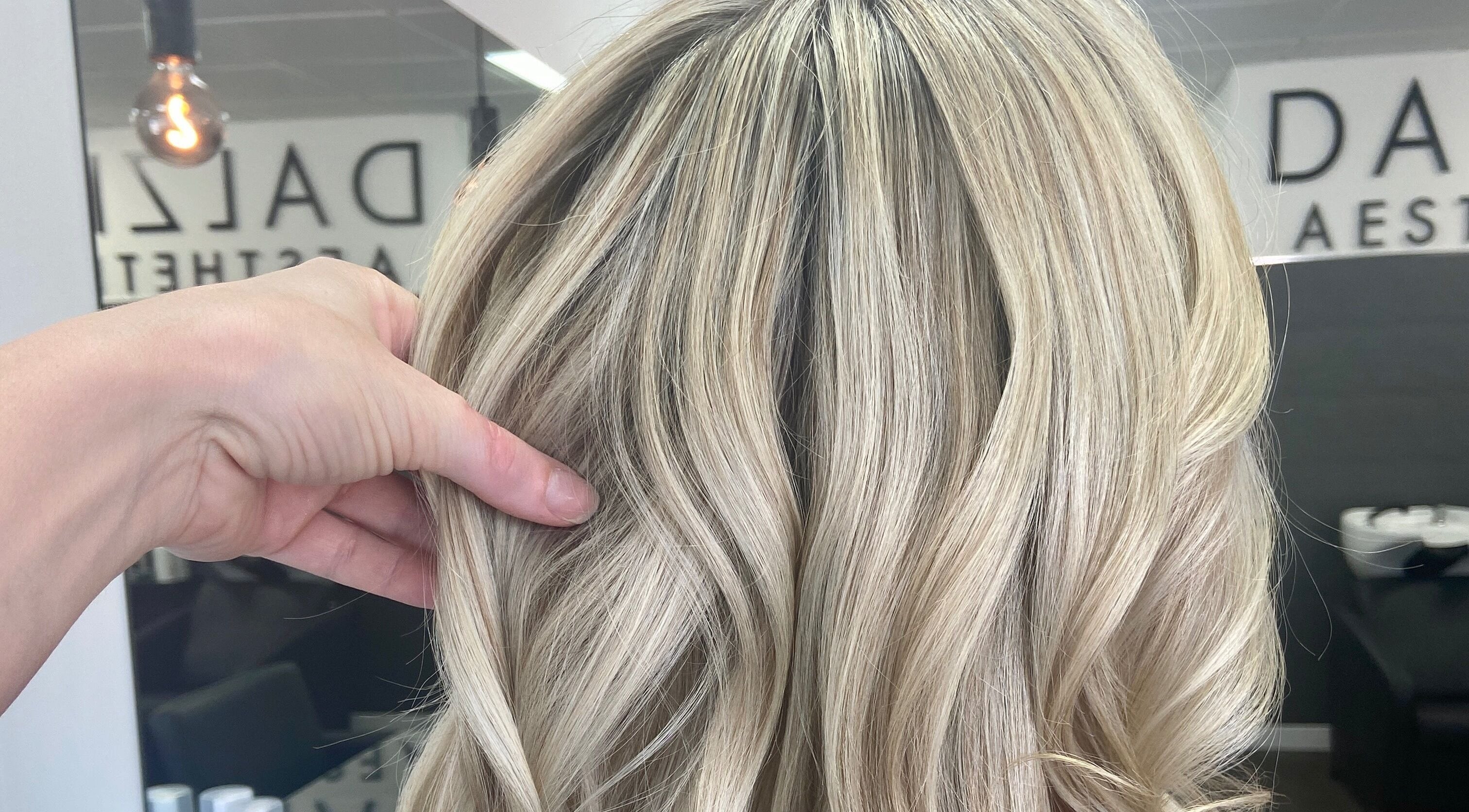 Styled blonde hair at Danielle Dunn Hairstylist & Extensionists, Motherwell, Scotland, GB.