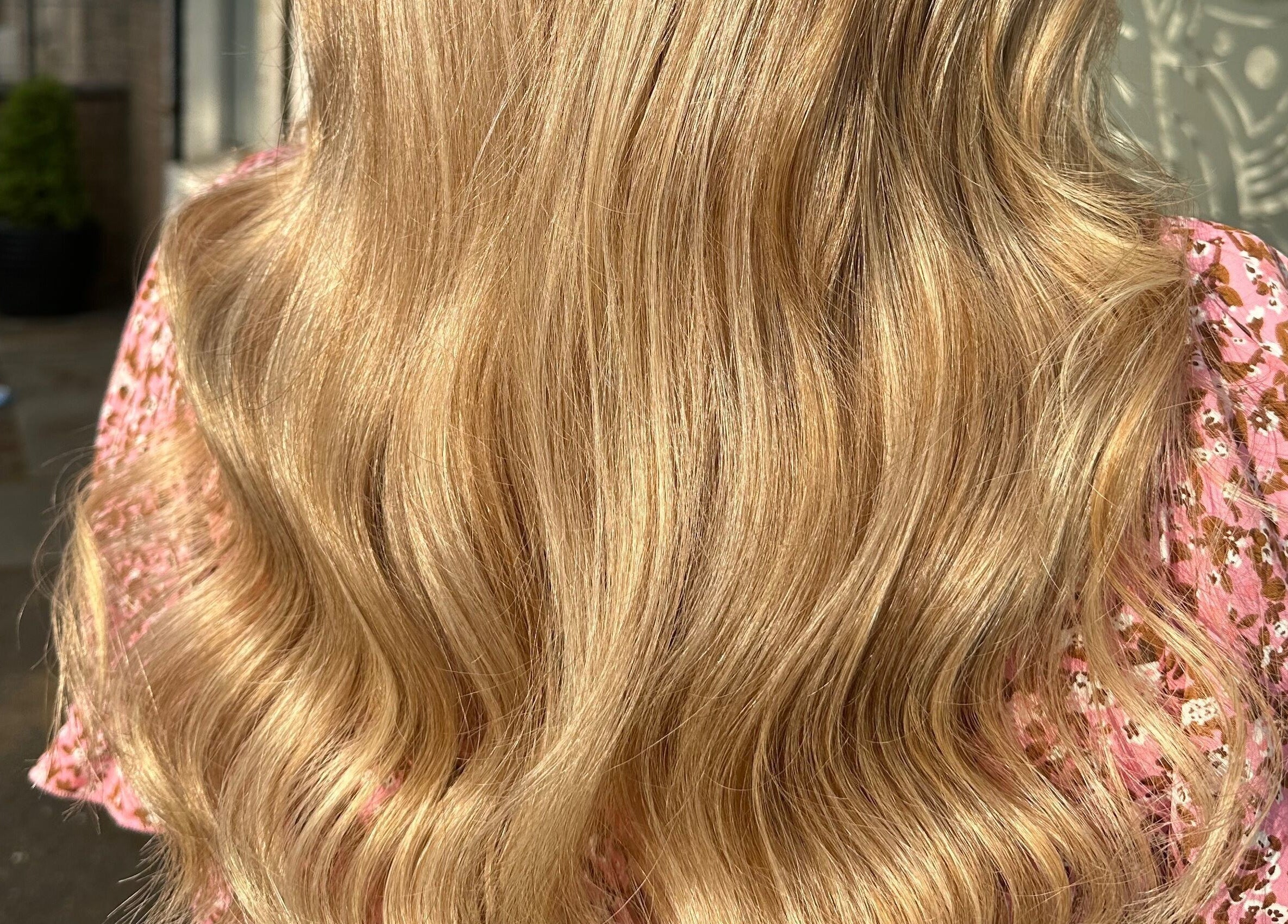 Blonde wavy hairstyle at Danielle Dunn Hairstylist & Extensionists, Motherwell, Scotland, GB.