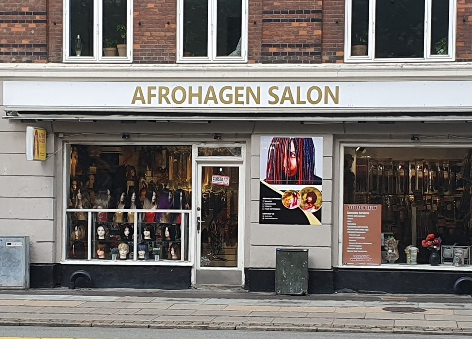 Front view of Afrohagen Salon and Kosmetik in Frederiksberg, Denmark, DK showcasing wigs and styling products.