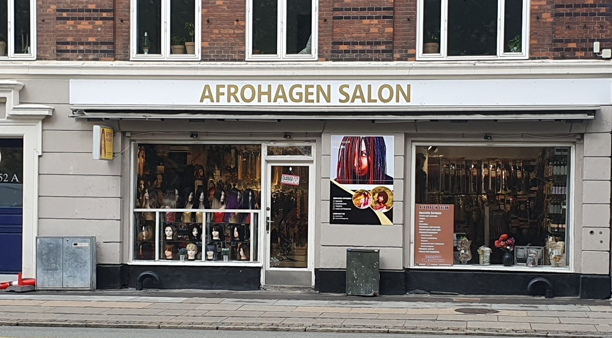 Front view of Afrohagen Salon and Kosmetik in Frederiksberg, Denmark, DK showcasing wigs and styling products.