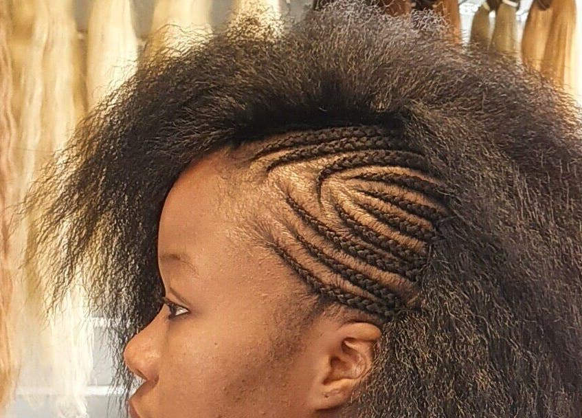 Intricate braids at Afrohagen Salon and Kosmetik, Frederiksberg, Denmark, DK showcasing skilled hairstyling.