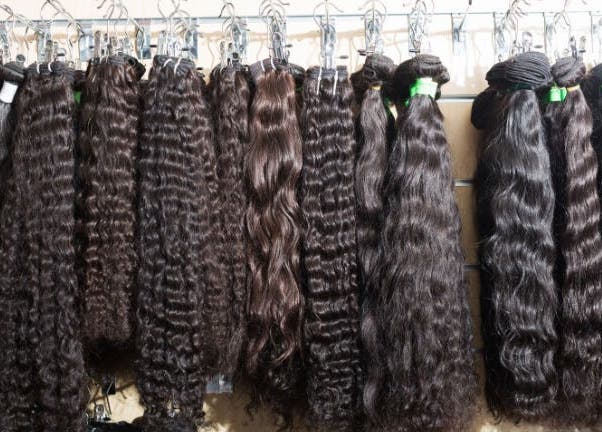 Diverse hair extensions displayed at Afrohagen Salon and Kosmetik, Frederiksberg, Denmark, DK.