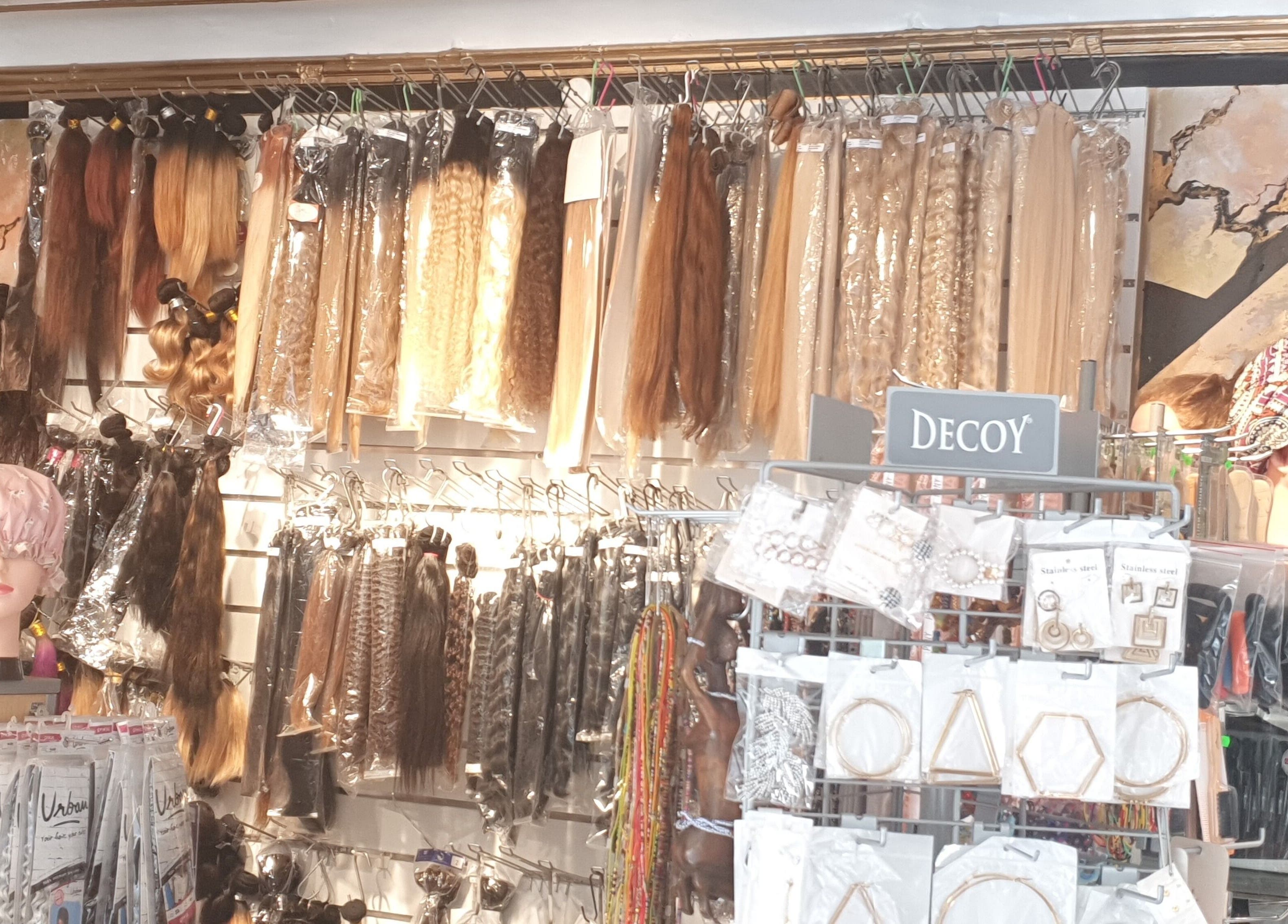 Diverse hair extensions and accessories displayed at Afrohagen Salon and Kosmetik, Frederiksberg, Denmark, DK.