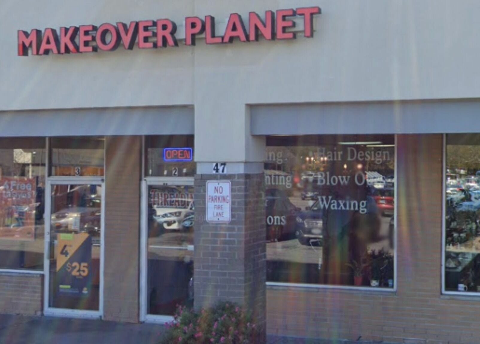 Front view of Makeover Planet in Poughkeepsie, New York, showcasing its storefront and signage.