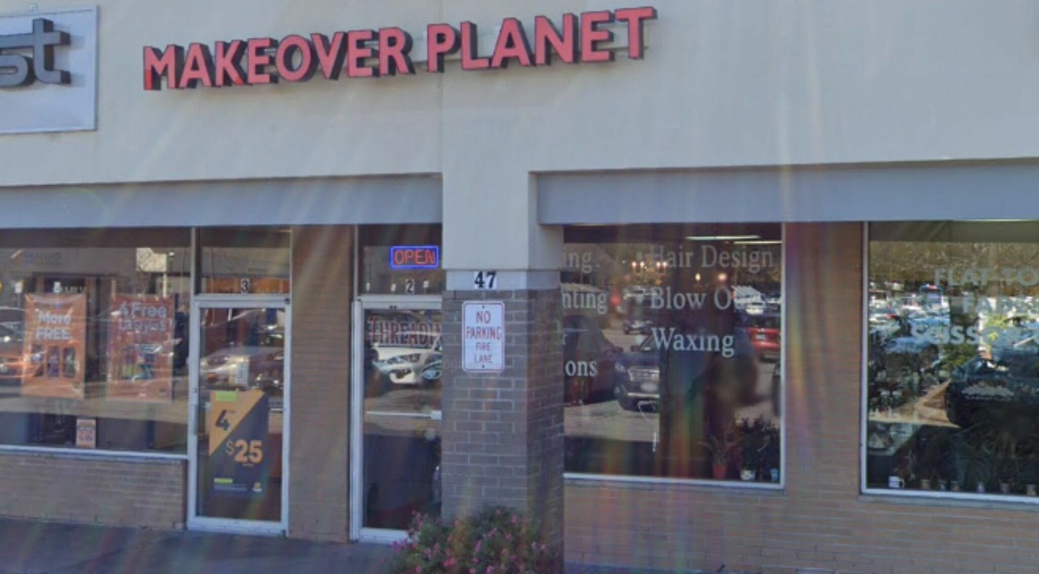 Front view of Makeover Planet in Poughkeepsie, New York, showcasing its storefront and signage.