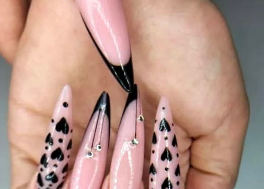 Stylish pink and black nail art at Me Time, Edenvale, Gauteng, ZA. Perfect for unique beauty expressions.