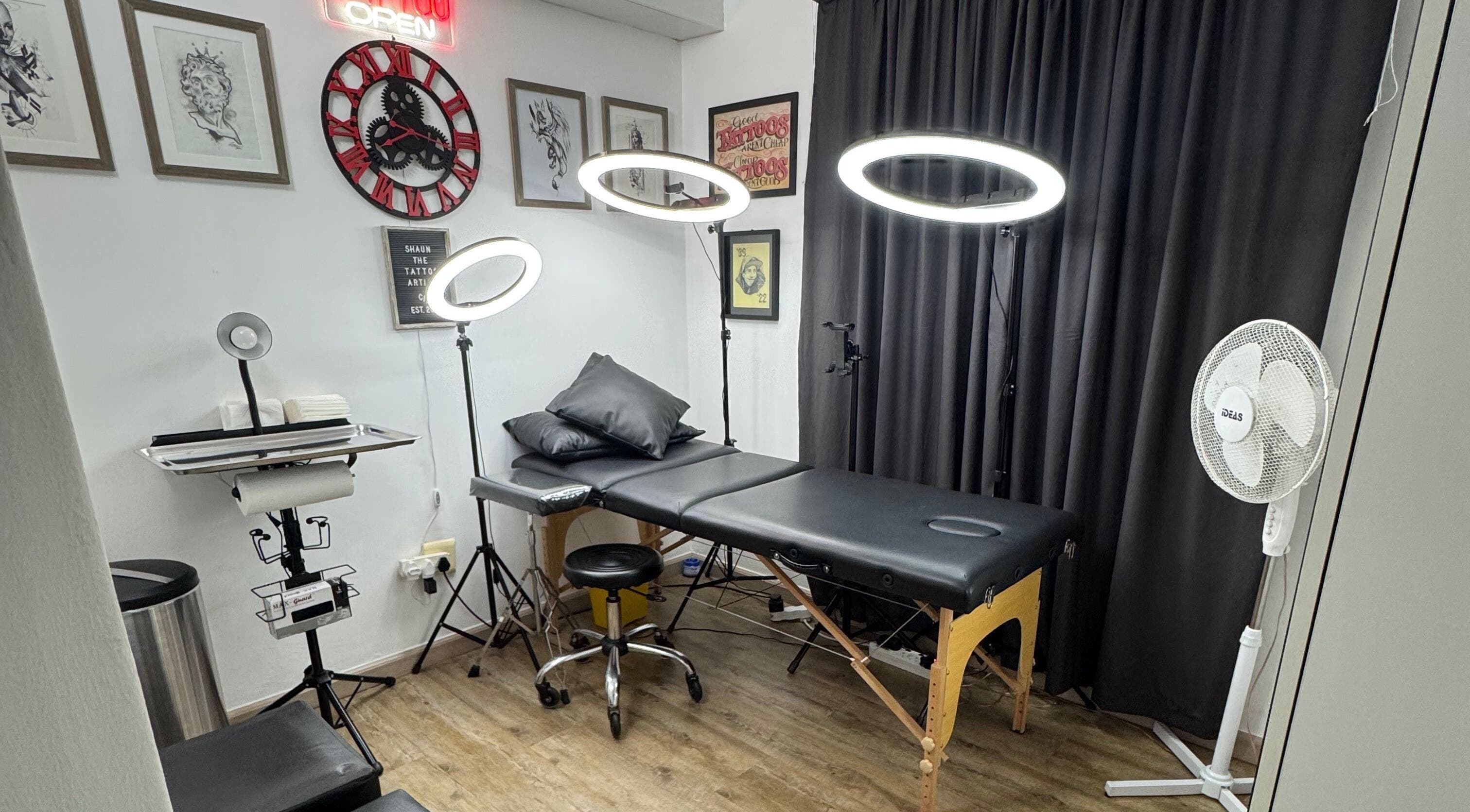 Tattoo studio setup at Shaun the Tattoo Artist, Cape Town, Western Cape, ZA with a cozy vibe.