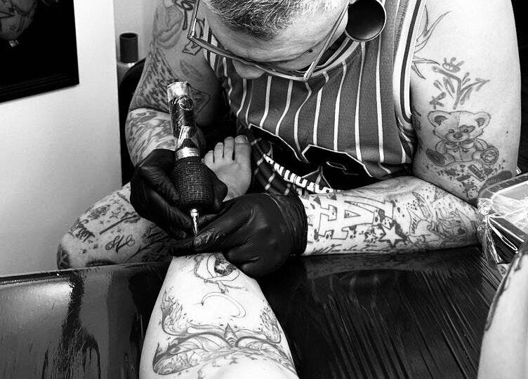 Shaun the Tattoo Artist crafting a detailed design in Cape Town, Western Cape, ZA.