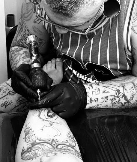 Shaun the Tattoo Artist crafting a detailed design in Cape Town, Western Cape, ZA.