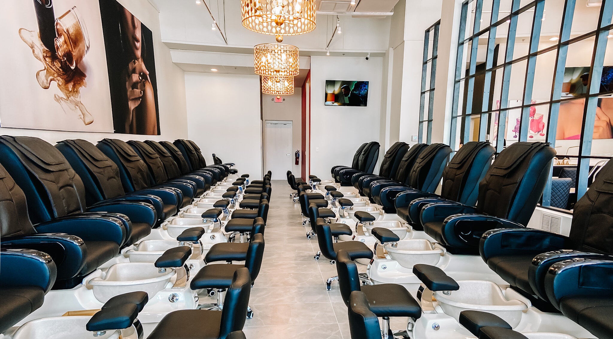 Sophisticated pedicure chairs line up at POLISH The Nail Bar in Odessa, Florida, US, showcasing luxury and comfort.