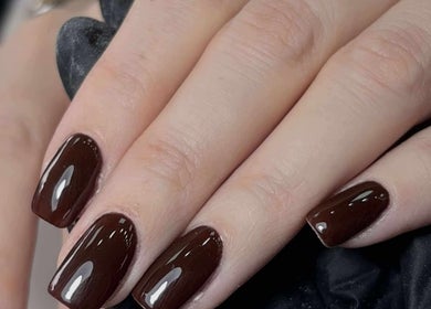 Elegant dark manicure at Get The Gloss, Hamilton, Scotland, GB showcasing precision and style.