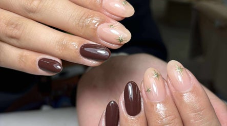 Elegant nail art with brown and nude tones at Get The Gloss, Hamilton, Scotland, GB.