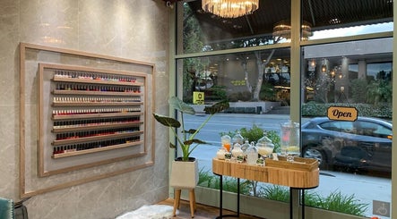 Champagne Nail Bar's elegant nail polish display in Santa Barbara, California, US.