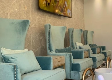 Elegant pedicure chairs at Champagne Nail Bar in Santa Barbara, California, US for ultimate relaxation.