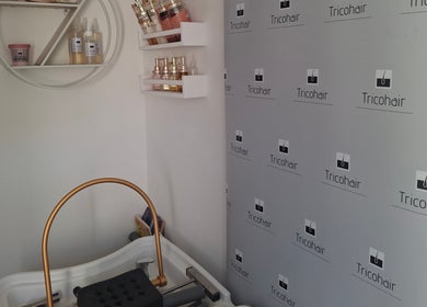 Chic salon corner at Trichohair, London, England, GB, showcasing stylish haircare products and elegant design.