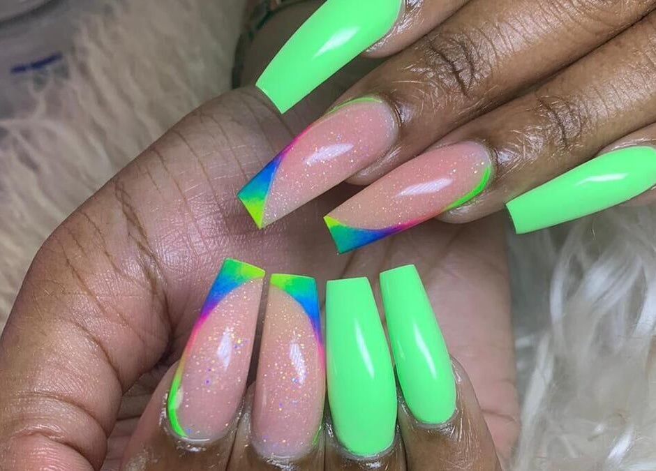 Vibrant neon nail art at Slay By Daè in St. James, BB showcasing intricate design.