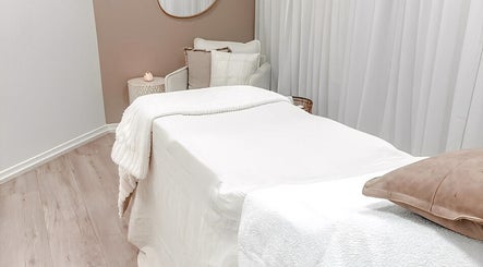 Elegant spa room at Zovia Beauty, Griffith, Australian Capital Territory, AU, featuring a cozy massage table.