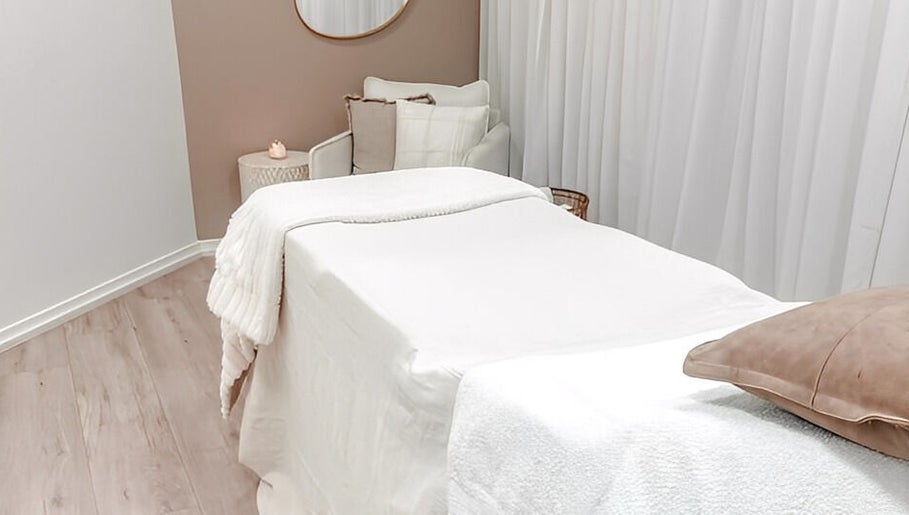 Cozy treatment room at Zovia Beauty, Griffith, Australian Capital Territory, AU, featuring a plush treatment bed.