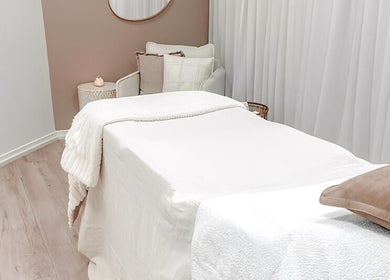 Cozy treatment room at Zovia Beauty, Griffith, Australian Capital Territory, AU, featuring a plush treatment bed.
