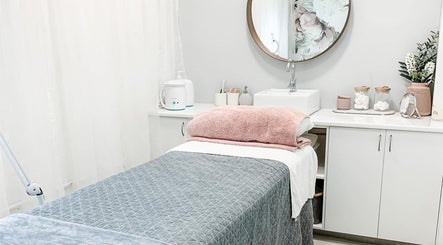 Relaxing spa treatment room at Zovia Beauty in Griffith, Australian Capital Territory, AU, featuring plush linens.