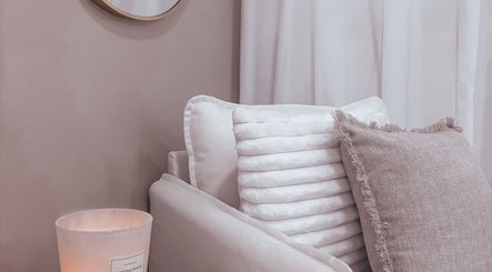 Comfortable lounge chair with pillows at Zovia Beauty, Griffith, Australian Capital Territory, AU.