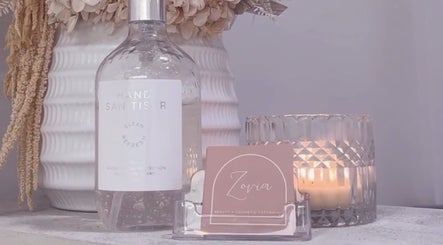 Elegant display of a candle and Zovia Beauty card at Griffith, Australian Capital Territory, AU.