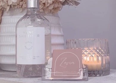 Zovia Beauty showcase with elegant decor, candle, and hand sanitizer in Griffith, Australian Capital Territory, AU.