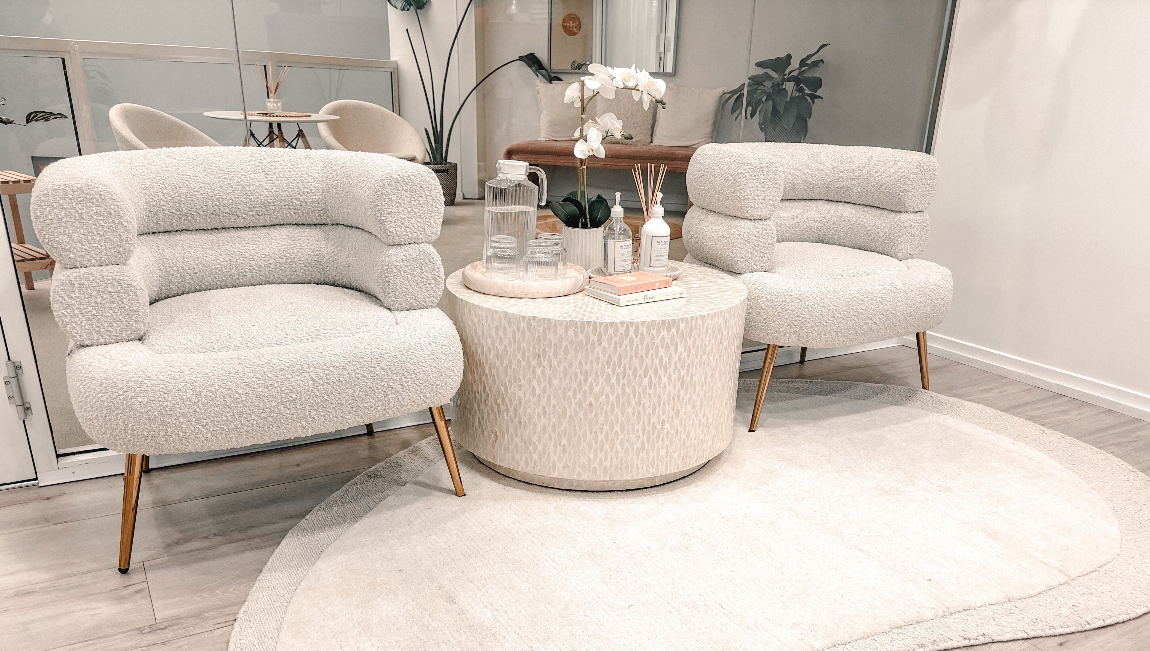 Elegant seating at Zovia Beauty in Griffith, Australian Capital Territory, AU with plush chairs and stylish decor.