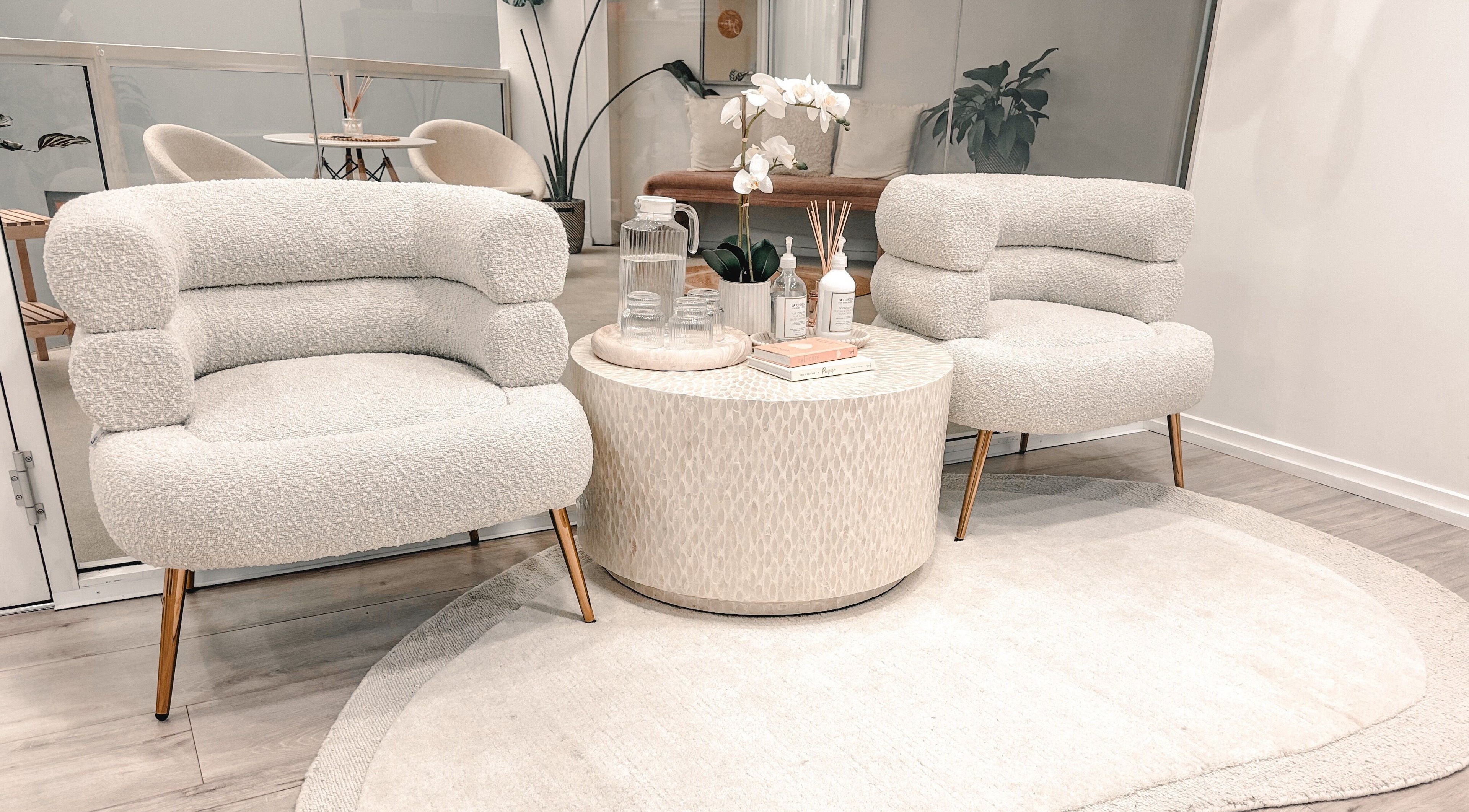 Elegant seating at Zovia Beauty in Griffith, Australian Capital Territory, AU with plush chairs and stylish decor.