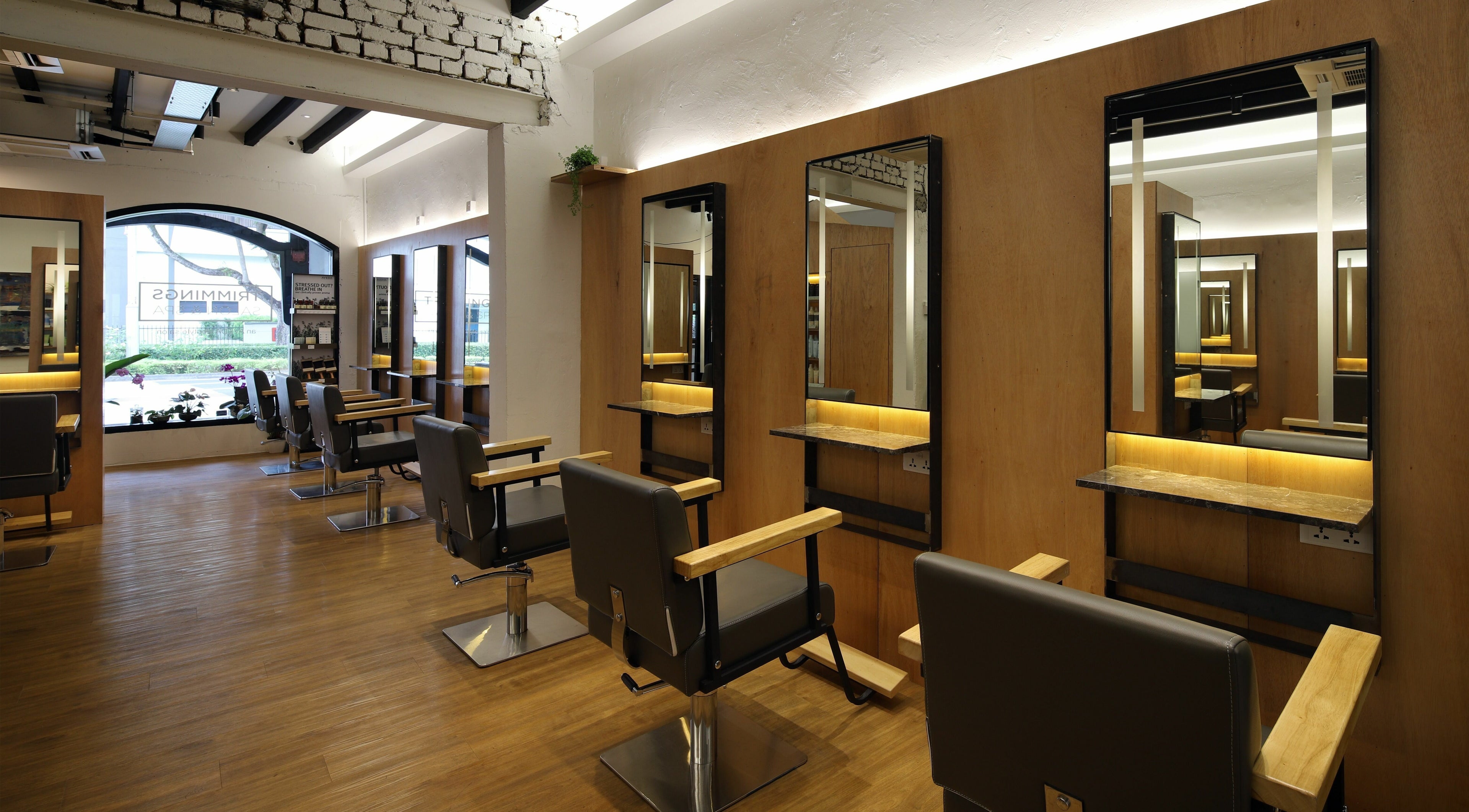 Interior of Trimmings Salon and Spa | Orchard Road in Singapore, Singapore, SG with modern styling chairs.
