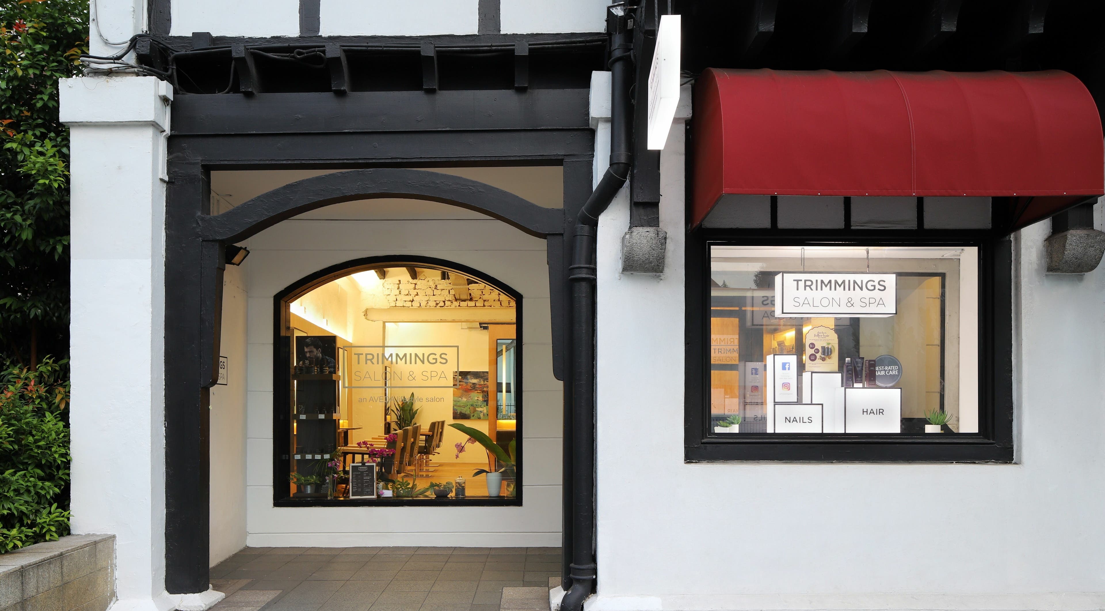 Entrance of Trimmings Salon and Spa | Orchard Road, Singapore, Singapore, SG with elegant black and white design.