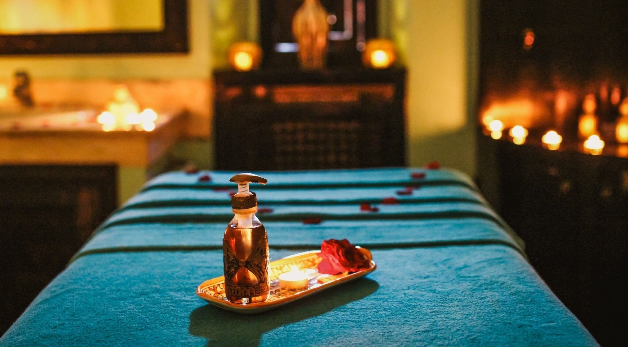 Relaxing spa setup at Spa Les Borjs de la Kasbah, Marrakesh, Marrakesh-Safi, MA with candles and oils.