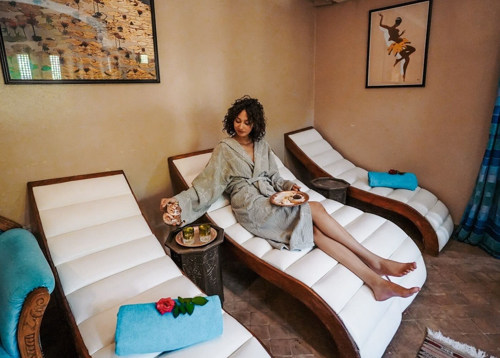 Woman enjoying spa day at Spa Les Borjs de la Kasbah, Marrakesh, Marrakesh-Safi, MA on a luxe lounger.
