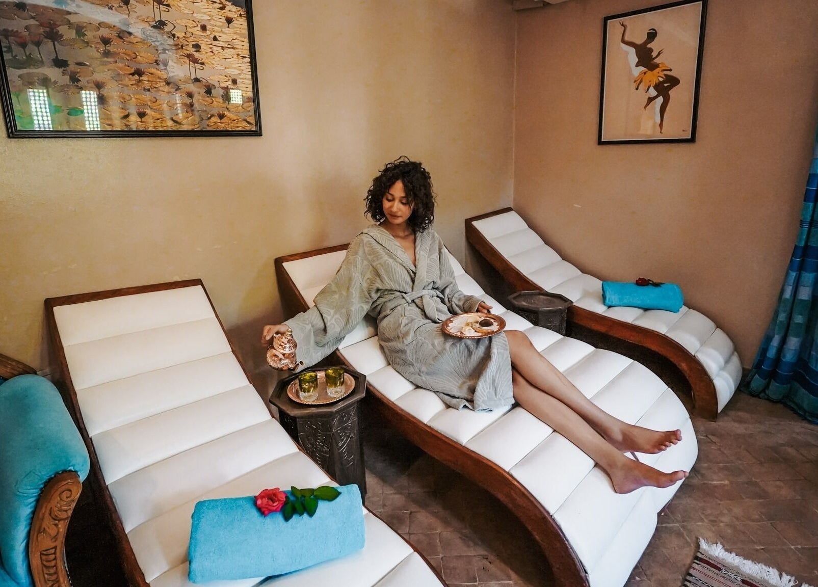 Woman enjoying spa day at Spa Les Borjs de la Kasbah, Marrakesh, Marrakesh-Safi, MA on a luxe lounger.