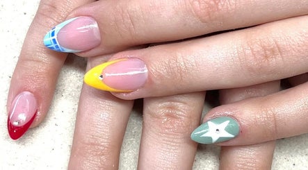 Colorful artistic nails at Suzi Q Nails, Melbourne, Victoria, AU, showcasing trendy design.