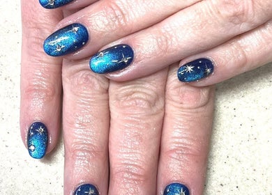 Starry navy blue nail art at Suzi Q Nails, Melbourne, Victoria, AU. Elegant and artistic manicure design.