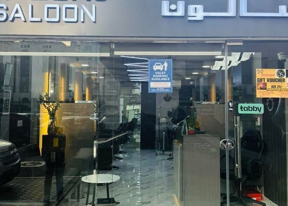 Front view of The Scissors N Razors Saloon in Abu Dhabi, AE, showing a modern, inviting entrance.