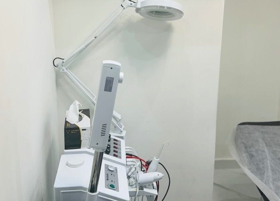 Professional spa equipment at The Scissors N Razors Saloon, Abu Dhabi, AE. Peaceful, well-lit treatment room.