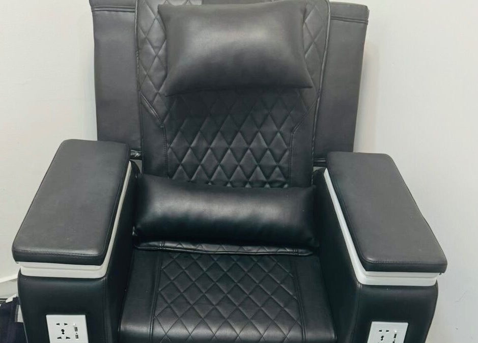 Luxury salon chair at The Scissors N Razors Saloon, Abu Dhabi, Abu Dhabi, AE, offering ultimate relaxation.