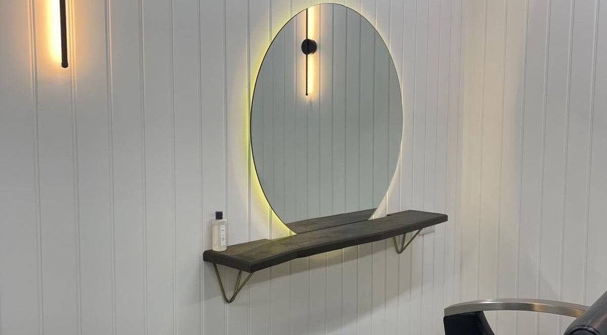 Stylish salon mirror and chair at Hayley Marie Hairdressing, Peterborough, England, GB.